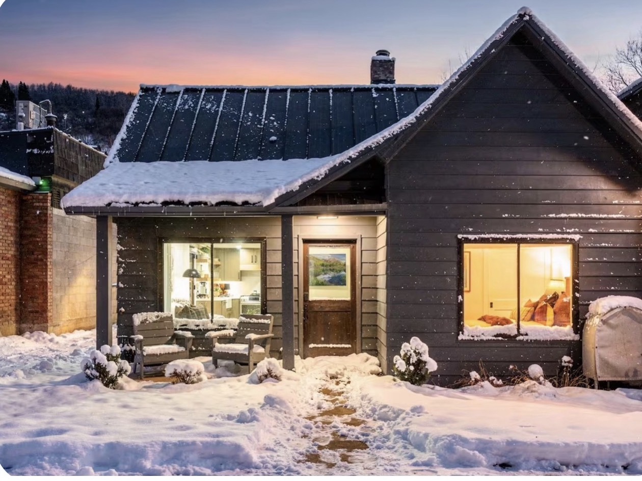 Après on Park Ave today — restored historic cottage at dusk in winter