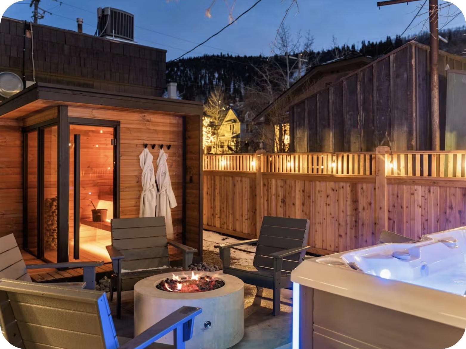 Backyard garden with hot tub and fire pit